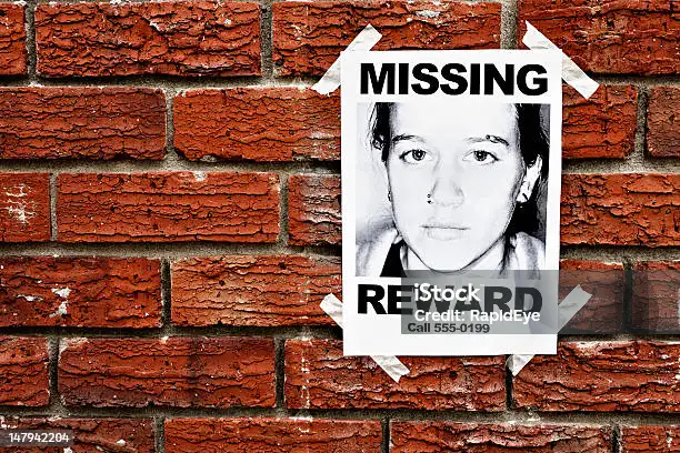 quot-missing-quot-poster-of-teenage-girl-taped-to-red-brick-wall.webp