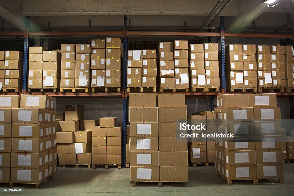 large-number-of-boxes-stacked-in-warehouse.jpg