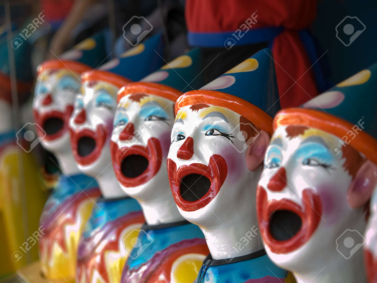 50392009-line-of-ceramic-clown-head-with-open-mouths-at-a-game-at-the-canadian-national-exhibition-toronto-on.jpg